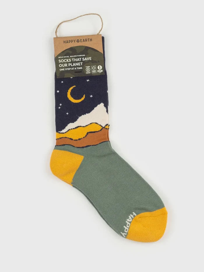 Starry Night Socks showing a night sky with moon and colorful mountains and orange toes