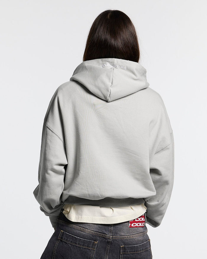 STARS HOODIE PALE GREY - pale grey star print hoodie, back view on female model - Cold Culture #woman