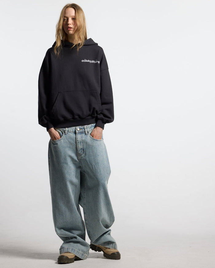 STARS V2 PANTS LIGHT BLUE DENIM - light blue baggy denim pants, front view on female model - Cold Culture