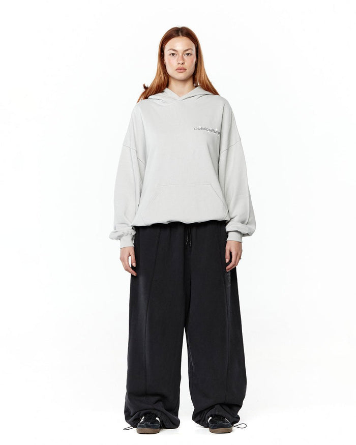 STELLAR HOODIE LIGHT GREY - light grey oversized hoodie, front view on female model - Cold Culture #woman