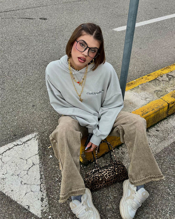 STELLAR HOODIE LIGHT GREY - light grey oversized hoodie, street style shot - Cold Culture
