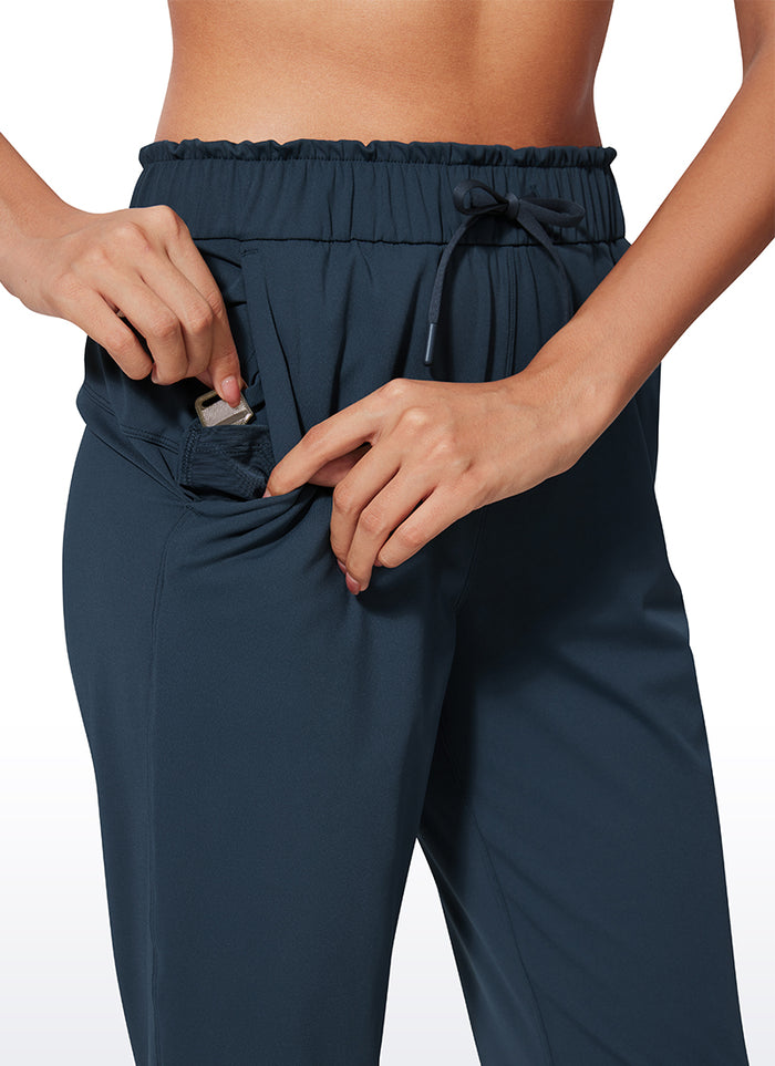 CRZ YOGA Women's Travel Slim Fit Stretch Drawstring 7/8 Pants 27'' True Navy