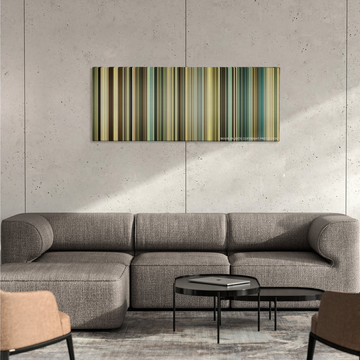 Taken 3 color palette canvas on a concrete wall above a gray sectional sofa