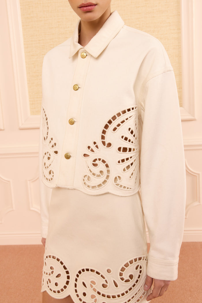Cowrie Designer Eyelet Jacket, Coiling Motif & Gold Button Close-Up | Ulla Johnson