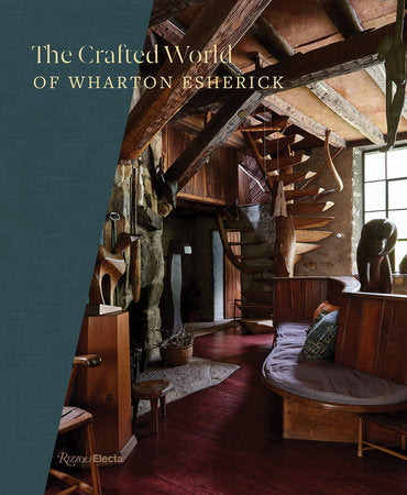 Cover of the book 'The Crafted World of Wharton Esherick' showing an interior view of Wharton Esherick's studio with wooden beams and furniture.