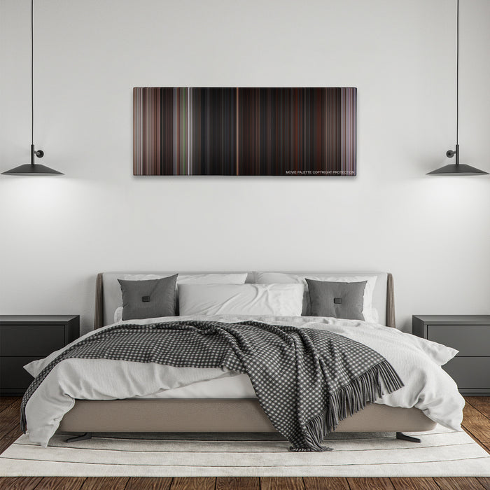The Goonies color palette canvas above a bed, between two black pendant lamps