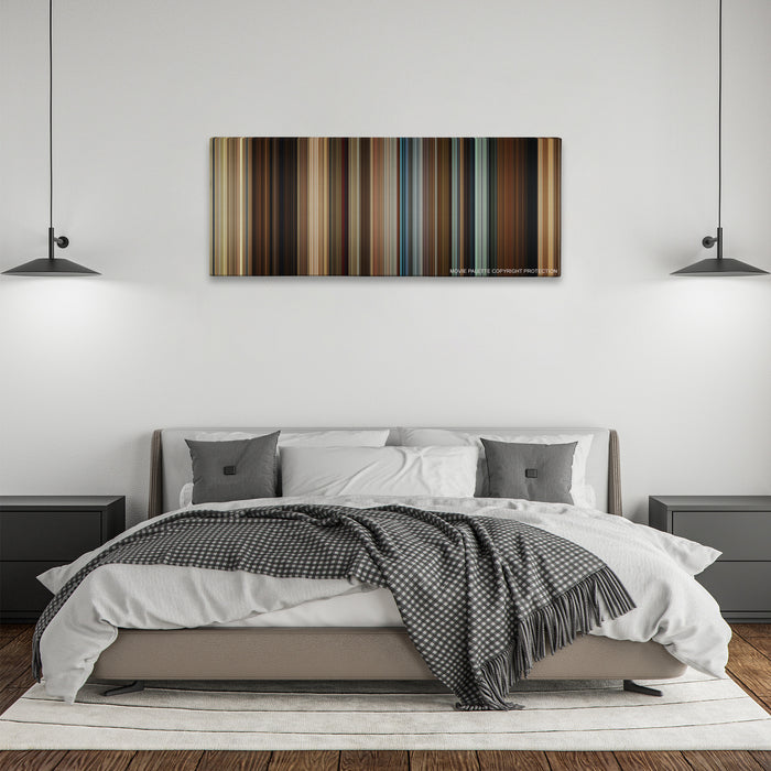 The Hunt color palette canvas above a bed, between two black pendant lamps
