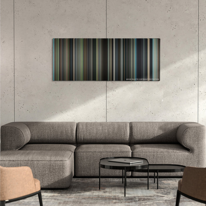The Judge color palette canvas on a concrete wall above a gray sectional sofa