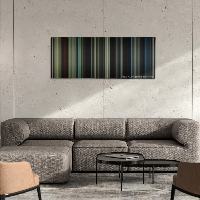 The Maze Runner color palette canvas on a concrete wall above a gray sectional sofa