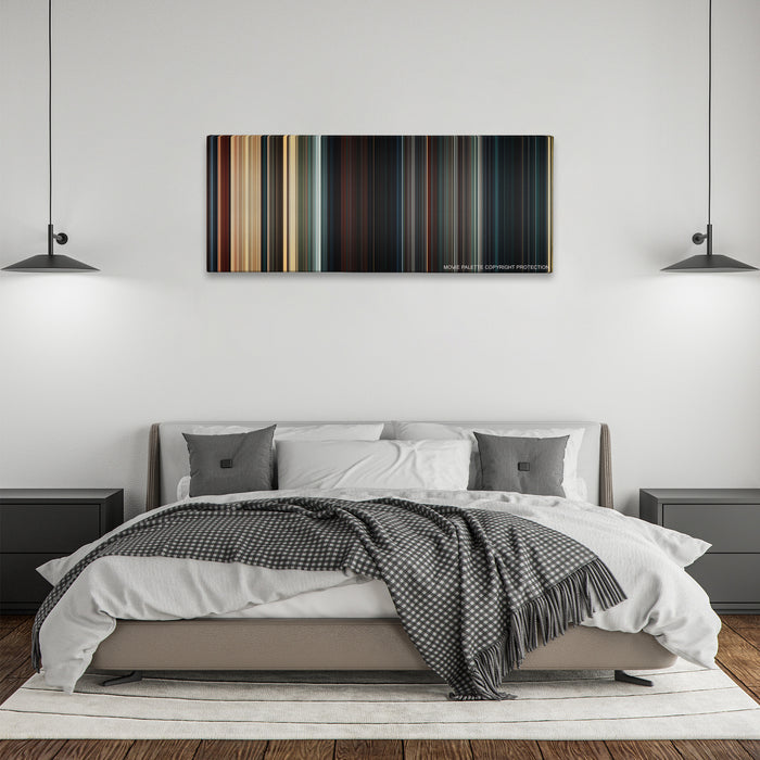 The Mummy color palette canvas above a bed, between two black pendant lamps
