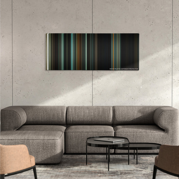 The Woman in Black color palette canvas on a concrete wall above a gray sectional sofa