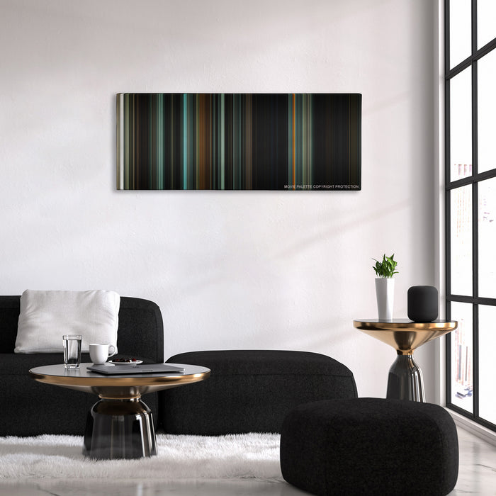 The Woman in Black color palette canvas above a black sofa with a gold-topped table