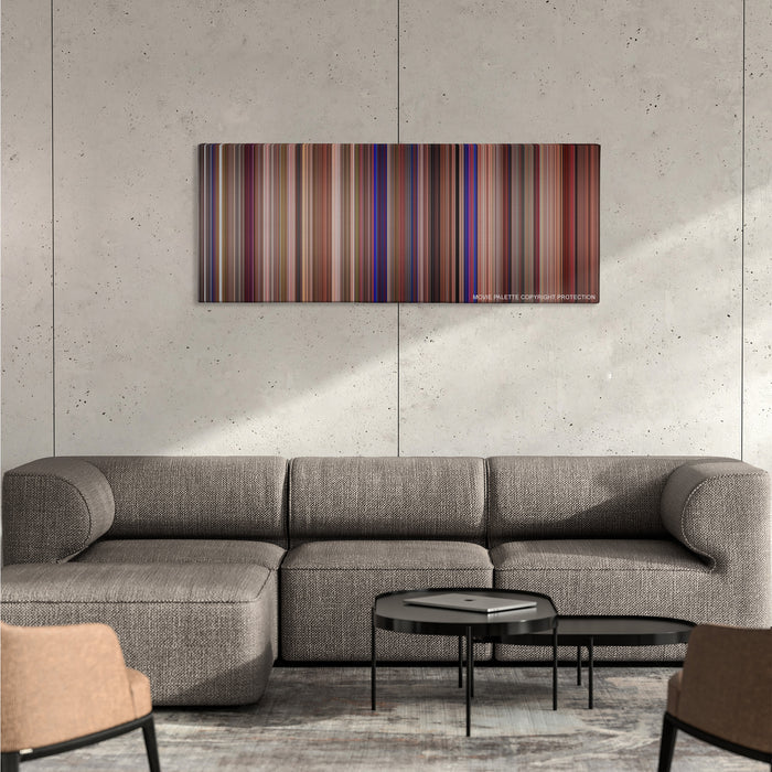 This Is Spinal Tap color palette canvas on a concrete wall above a gray sectional sofa