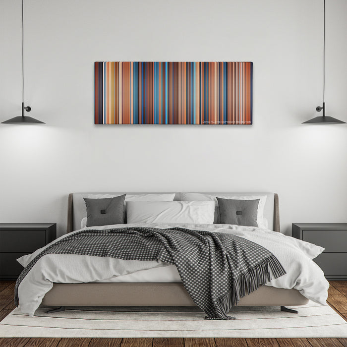 This Means War color palette canvas above a bed, between two black pendant lamps