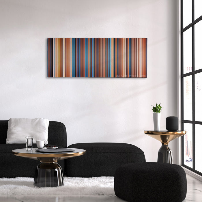 This Means War color palette canvas above a black sofa with a gold-topped table