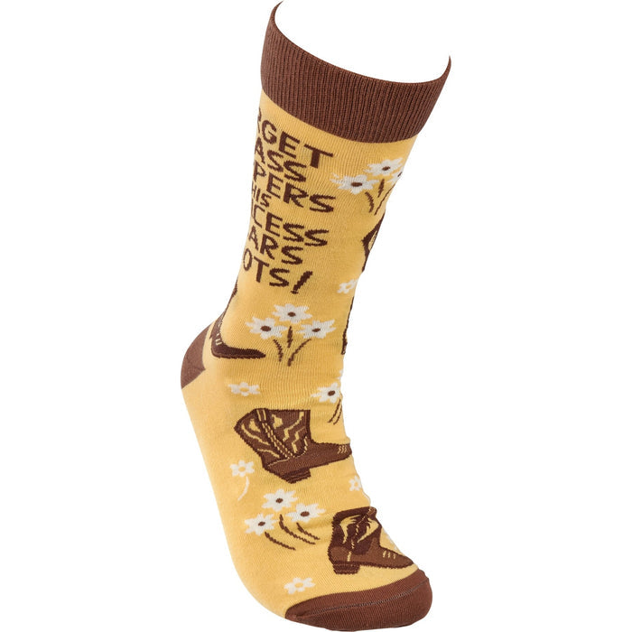 Yellow sock with brown toe and cuff showing desert boots and flowers