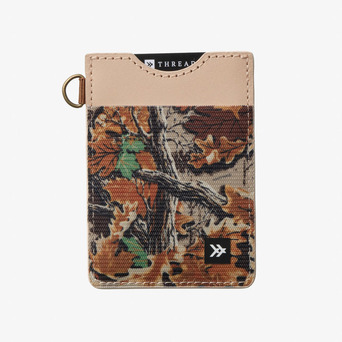 Thread Patterned vertical leather elastic wallet with tan top and woodland camouflage fabric panel