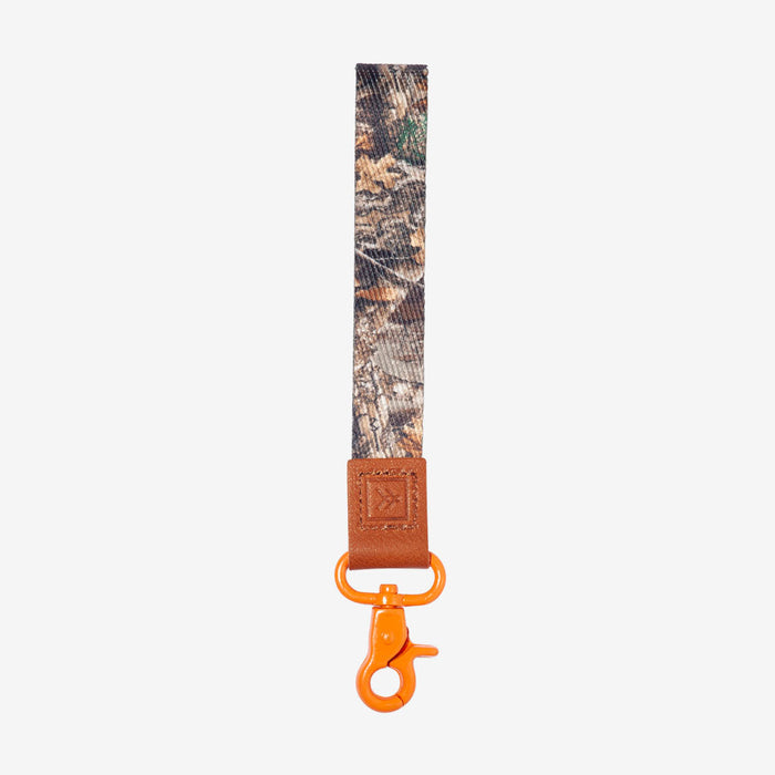 Camouflage print wrist lanyard with brown leather end and bright orange swivel hook