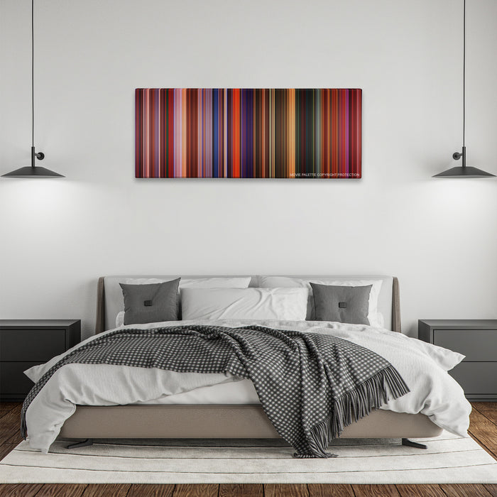 Treasure Planet color palette canvas above a bed, between two black pendant lamps