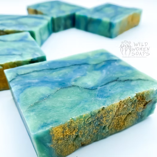 Turquoise marble soap with blue tones and a metallic gold edge accent on the side
