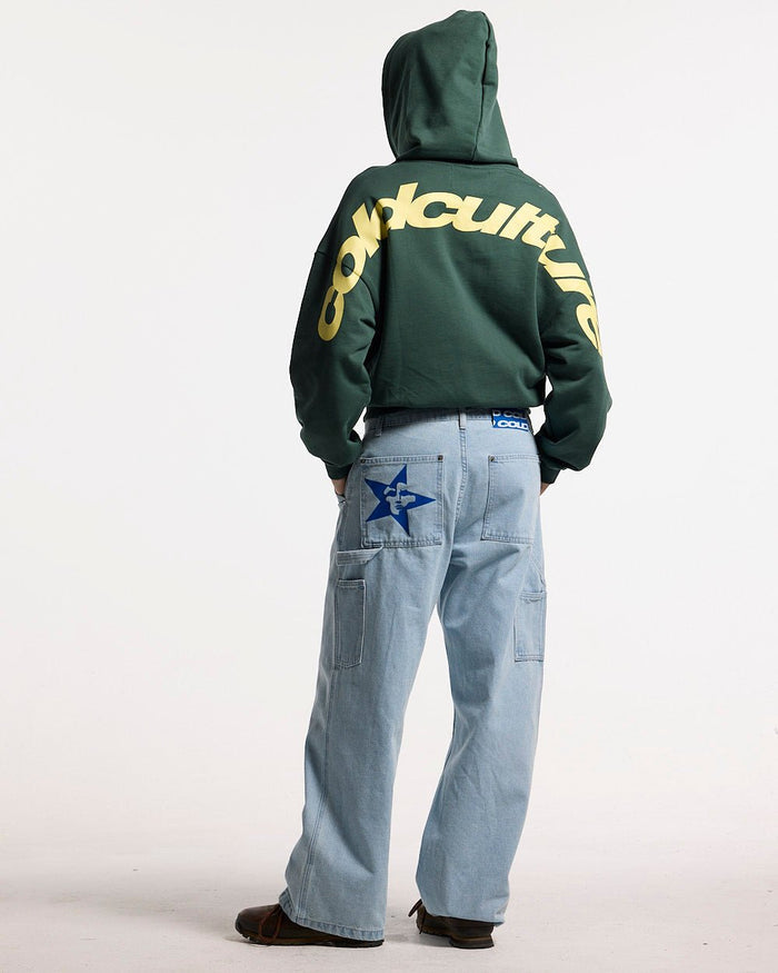 V1 CARPENTER PANTS LIGHT DENIM - light blue denim carpenter pants, back view on female model - Cold Culture #woman