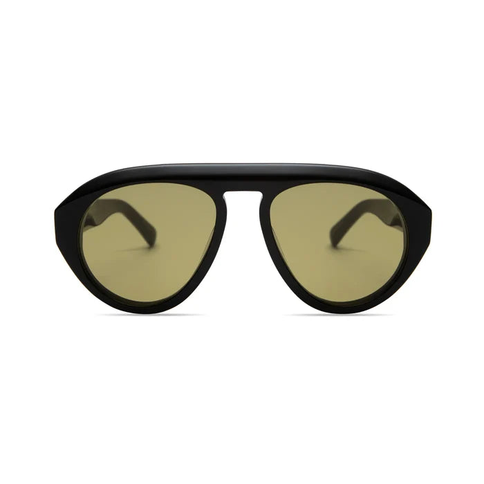 The Val Sunglasses by Elisa Johnson feature black aviator frames with large, rounded yellow-tinted UV400 lenses, displayed front-facing on a plain white background.