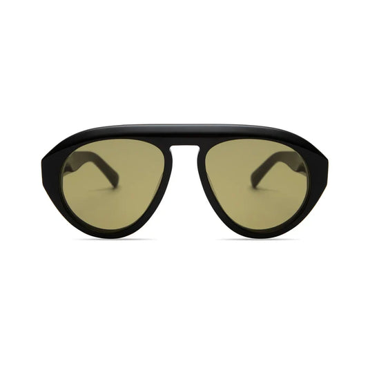 The Val Sunglasses by Elisa Johnson feature black aviator frames with large, rounded yellow-tinted UV400 lenses, displayed front-facing on a plain white background.