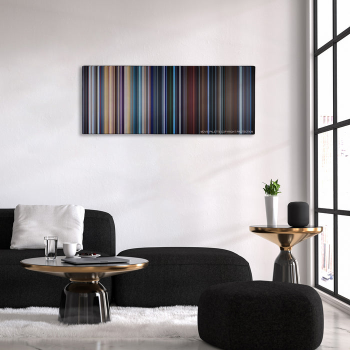 Valerian and the City of a Thousand Planets color palette canvas above a black sofa with a gold-topped table