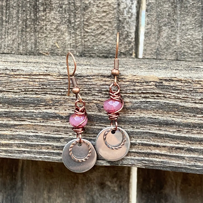Copper Venus drop earrings with pink faceted beads and hammered copper discs.