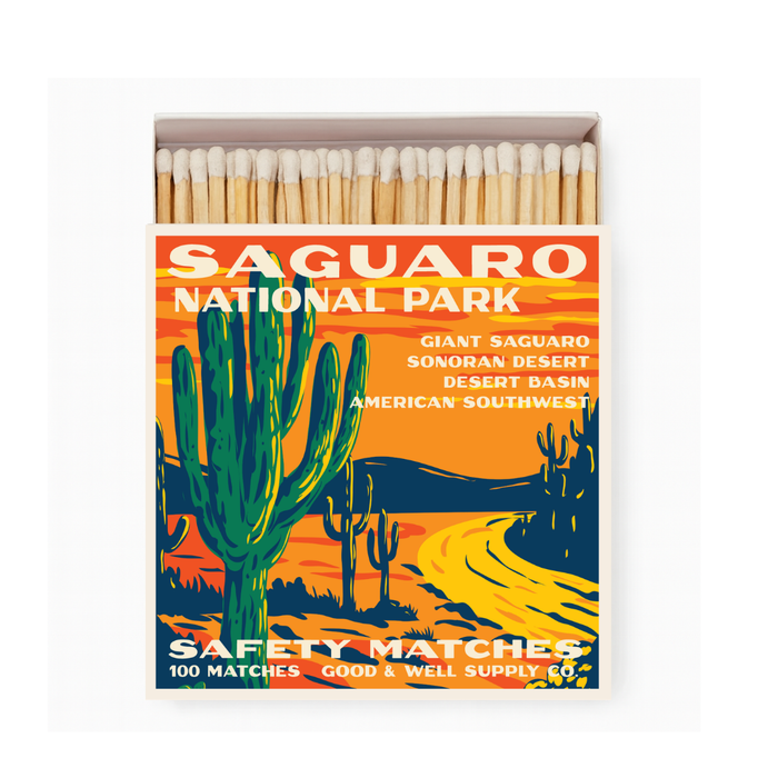 Saguaro National Park safety matches box with a vibrant desert poster showing tall cacti