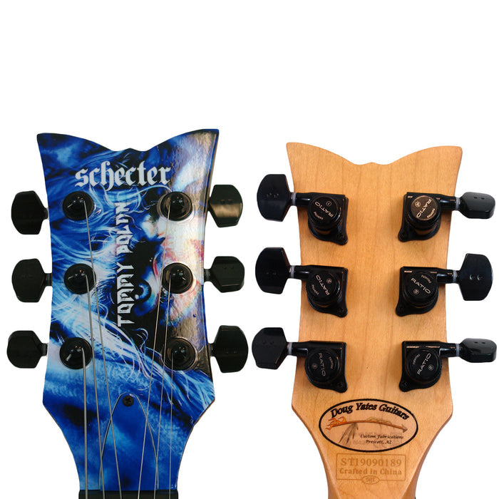 Front and back views of a Doro Limited Edition Guitar headstock; the front shows blue artwork with Doro and Tempest Custom text, while the back displays tuning pegs and maker details on a natural wood finish.