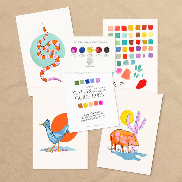 Desert Animals watercolor set laid out with multiple animal prints color palette sheet and guidebook.