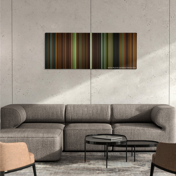 Whiplash color palette canvas on a concrete wall above a gray sectional sofa