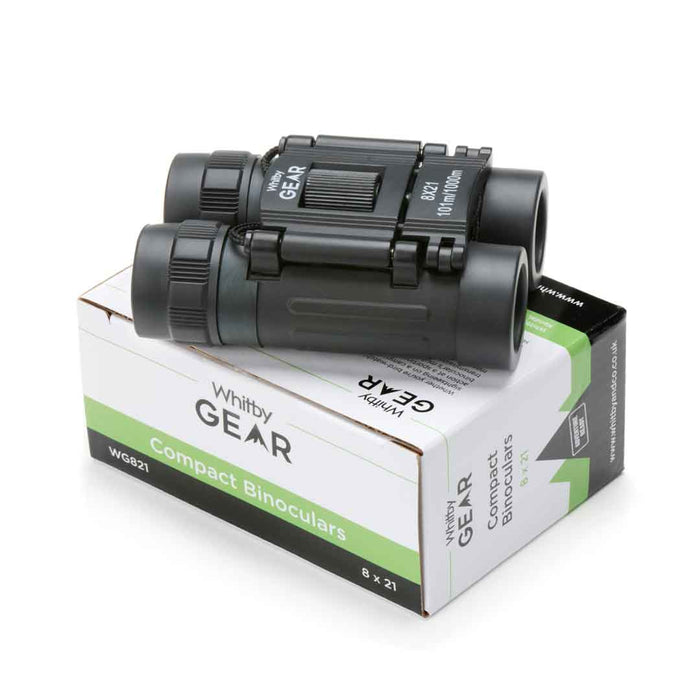 Whitby Gear Compact Pocket Binoculars 8 x magnification photographed with its packaging in a studio on a white background