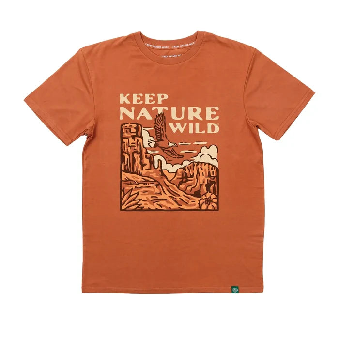 Burnt orange Wild Canyon tee with a bold KEEP NATURE WILD landscape graphic.