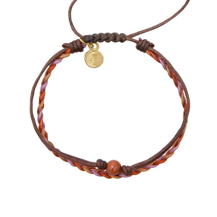 Zion National Park Bracelet with brown leather cord and orange purple braided strand accented by a small gold disc charm.